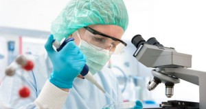 doctor in lab performs in vitro fertilization