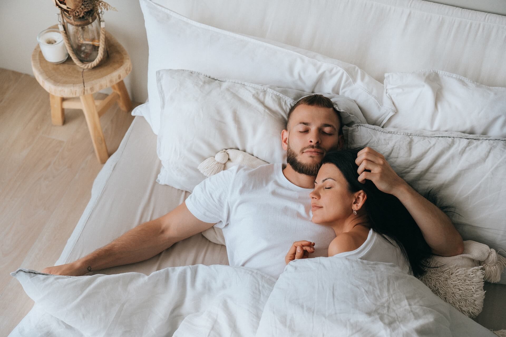 Couple resting at home representing healthy lifestyle habits and sleep while trying to conceive